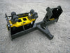 A heavy-duty skid steer receiver hitch, designed for use with large and powerful skid steer loaders.