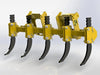 A detailed view of the working end of a skid steer ripper attachment.