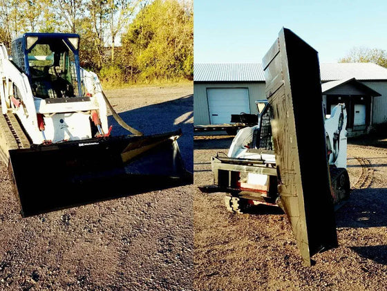 A skid steer with the black rectangular bucket sitting on top of a gravel road. 